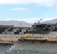 Port Bouvard Retreat - Large Family Friendly Canal Home with Private Jetty - Tourism Caloundra
