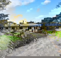 McKinnon's Holiday Home - Tourism Caloundra