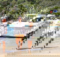 Sydney Harbour Boat Tour with Unique Beach Landings and Local Guide - Tourism Caloundra