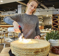 Flaming Cheese Wheel and Wine Pairing Experience - Tourism Caloundra