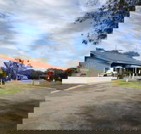 Emu Beach Chalets - Tourism Caloundra