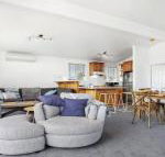 Penguin Cove relax on the beach - Tourism Caloundra