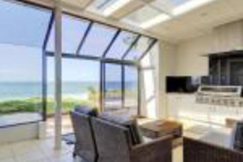 Whispering Sands 10 Sandy Point Road Luxury Waterfront Home With Aircon WIFI & Foxtel - Tourism Caloundra 0
