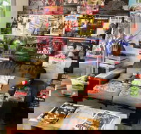 Brown Cardigan - Tourism Caloundra