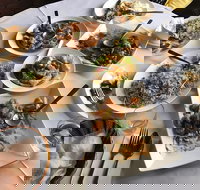 Mandarin Coin - Tourism Caloundra