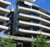 Accommodate Canberra - Realm Residences - Tourism Caloundra
