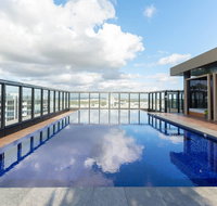 Japanese Style waterfront apt wt rooftop pool - Tourism Caloundra