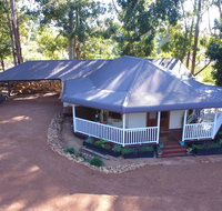 Quiet Escapes Cottages - Tourism Caloundra