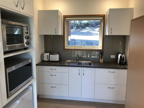 Loma Cottages - Tourism Caloundra 5