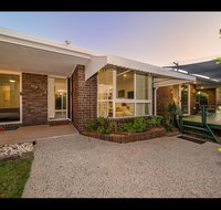 Woorim Secluded Palms Cottage - Tourism Caloundra